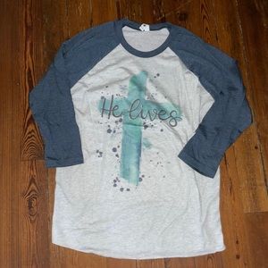 HE LIVES Baseball-style tee